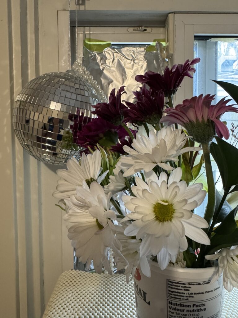 bouquet of flowers and a disco ball